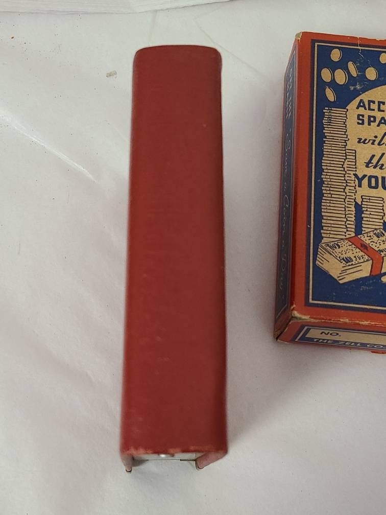 The Zell Company Red Book Coin Bank