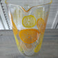 Front spout of glass Pyrex pitcher