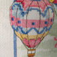Upclose cross stitching of hot air balloon